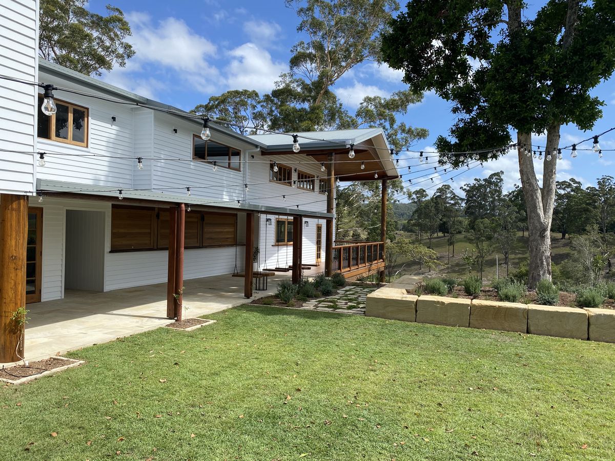 White weatherboard custom home